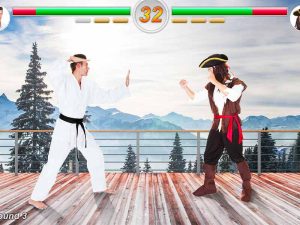 aman dressed in gi and a man dressed as a pirate standing facing each other in a fighting pose in a video game setting